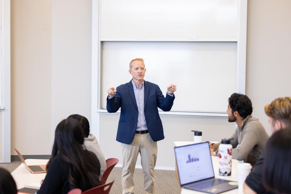 Lance Bradshaw speaking to a room of seated participants